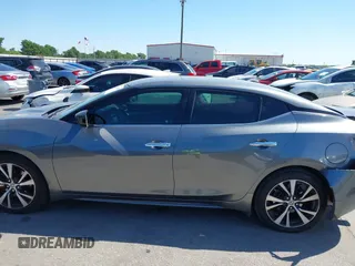 2016 Nissan Maxima SR with VIN 1N4AA6AP9GC414943, listed as a IAAI auction lot 41976295 with 154,738 mi miles and . Bid and sale history available at DreamBid. Image 15.
