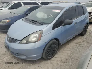 2009 Honda Fit with VIN JHMGE88279S071698, listed as a Copart auction lot 61294705 with 258,096 mi miles and Salvage title. Bid and sale history available at DreamBid. Image 1.