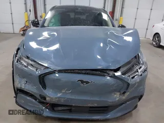 2023 Ford Mustang Mach-E Premium z VIN 3FMTK3SU7PMA77881, wystawiony jako IAAI lot #42277009 z przebiegiem Nie podano mil oraz . Historia ofert i sprzedaży dostępna na DreamBid. Obrazek 12.