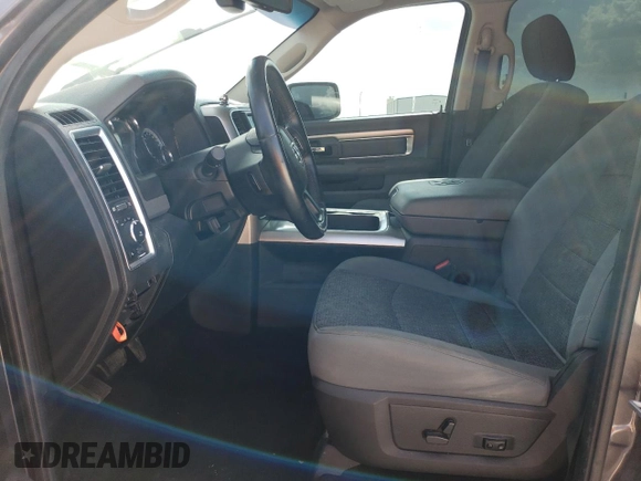 2016 Ram 1500 Lone Star with VIN 1C6RR6LM1GS355697, listed as a Copart auction lot 71757504 with 128,697 mi miles and Clean Title. Bid and sale history available at DreamBid. Image 7.