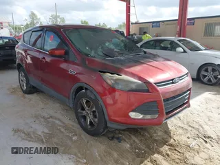 2014 Ford Escape SE z VIN 1FMCU9GX6EUC61587, wystawiony jako IAAI lot #42156637 z przebiegiem Nie podano mil oraz . Historia ofert i sprzedaży dostępna na DreamBid. Obrazek 1.