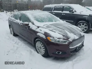 2013 Ford Fusion SE Hybrid with VIN 3FA6P0LU1DR316619, listed as a IAAI auction lot 41515812 with 136,669 mi miles and . Bid and sale history available at carsss.com. Image 1.