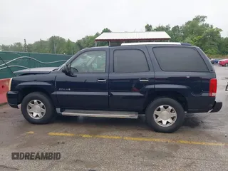 2005 Cadillac Escalade z VIN 1GYEK63N95R124940, wystawiony jako IAAI lot #42255300 z przebiegiem 160 355 mil mil oraz . Historia ofert i sprzedaży dostępna na DreamBid. Obrazek 14.