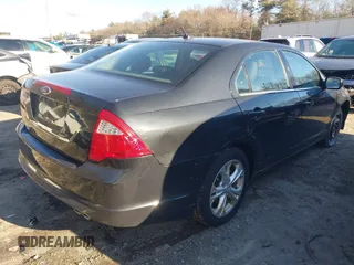 2012 Ford Fusion SE z VIN 3FAHP0HA8CR244002, wystawiony jako IAAI lot #41089721 z przebiegiem 239 745 mil mil oraz . Historia ofert i sprzedaży dostępna na DreamBid. Obrazek 4.