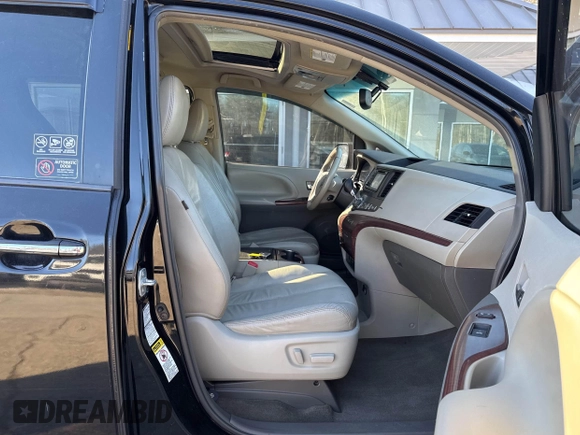 2013 Toyota Sienna XLE with VIN 5TDDK3DC3DS052713, listed as a IAAI auction lot 41451844 with 284,884 mi miles and . Bid and sale history available at DreamBid. Image 5.
