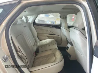 2017 Ford Fusion Titanium z VIN 3FA6P0K96HR132389, wystawiony jako Copart lot #57312665 z przebiegiem Nie podano mil oraz Szkoda całkowita • Salvage title. Historia ofert i sprzedaży dostępna na DreamBid. Obrazek 10.