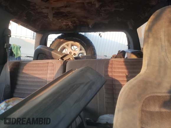 1993 Jeep Grand Cherokee Laredo with VIN 1J4GZ58Y9PC677532, listed as a Copart auction lot 44391245 with 178,772 mi miles and Salvage Title. Bid and sale history available at carsss.com. Image 10.
