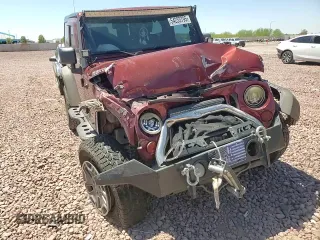 2010 Jeep Wrangler Rubicon with VIN 1J4BA6D14AL167077, listed as a Copart auction lot 54233795 with 148,638 mi miles and Salvage title. Bid and sale history available at DreamBid. Image 13.