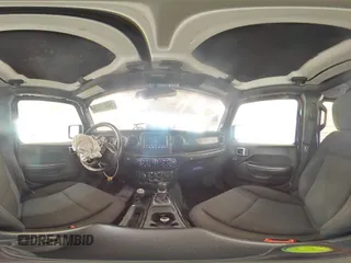 2020 Jeep Wrangler Unlimited Sport Altitude with VIN 1C4HJXDN9LW154318, listed as a Copart auction lot 56473335 with 99,482 mi miles and Salvage title. Bid and sale history available at DreamBid. Image 14.