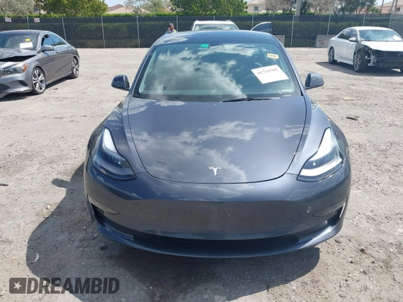 2023 Tesla Model 3 with VIN 5YJ3E1EA3PF623114, listed as a IAAI auction lot 41710385 with 31,663 mi miles and . Bid and sale history available at carsss.com. Image 12.