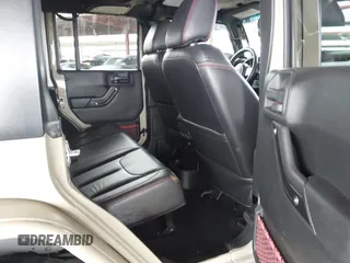 2017 Jeep Wrangler Unlimited Rubicon with VIN 1C4BJWFG7HL663203, listed as a IAAI auction lot 42391999 with 63,430 mi miles and . Bid and sale history available at DreamBid. Image 8.