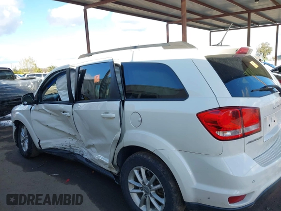2014 Dodge Journey SXT with VIN 3C4PDCBGXET122969, listed as a IAAI auction lot 41741679 with 151,285 mi miles. Bid and sale history available at carsss.com. Image 14.