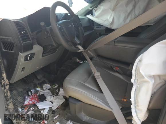 2020 Ford F-150 XL with VIN 1FTEW1CB4LKD41983, listed as a Copart auction lot 57474095 with 128,360 mi miles and Salvage title. Bid and sale history available at DreamBid. Image 7.