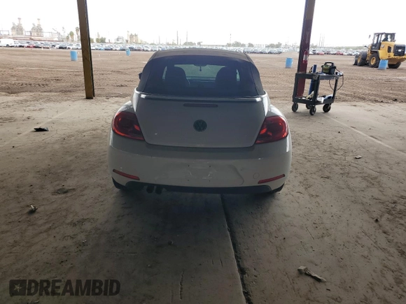 2013 Volkswagen Beetle 2.5L with VIN 3VW5P7AT2DM811768, listed as a Copart auction lot 55799135 with 60,505 mi miles and Salvage Title. Bid and sale history available at DreamBid. Image 6.