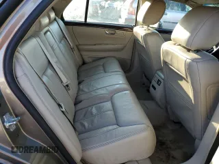 2010 Cadillac DTS 1SD z VIN 1G6KH5EY8AU108702, wystawiony jako Copart lot #76286984 z przebiegiem 177 455 mil mil oraz Szkoda całkowita • Salvage title. Historia ofert i sprzedaży dostępna na DreamBid. Obrazek 10.