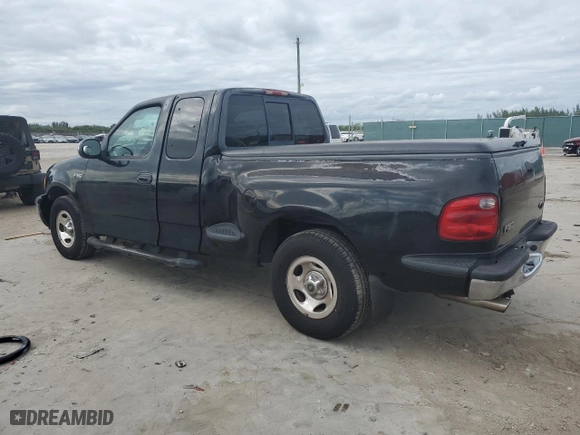 2002 Ford F-150 XL with VIN 2FTRX07222CA18022, listed as a Copart auction lot 80419784 with 283,975 mi miles and Salvage Title. Bid and sale history available at carsss.com. Image 2.