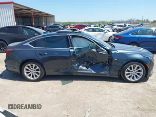 2021 Cadillac CT5 Luxury z VIN 1G6DW5RKXM0144424, wystawiony jako IAAI lot #41985803 z przebiegiem 65 555 mil mil oraz . Historia ofert i sprzedaży dostępna na DreamBid. Obrazek 13.