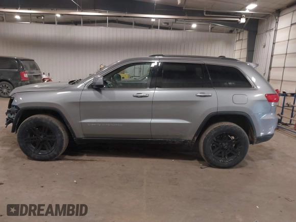 2015 Jeep Grand Cherokee Laredo with VIN 1C4RJFAG4FC797069, listed as a IAAI auction lot 41435299 with 146,755 mi miles. Bid and sale history available at carsss.com. Image 14.