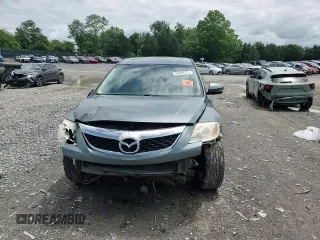 2011 Mazda CX-9 Grand Touring с VIN JM3TB2DA2B0311879, выставлен на аукционе Copart как лот 56294315 с пробегом 231 716 миль миль и Чистый • Clean title. История ставок и продаж доступна на DreamBid. Изображение 14.