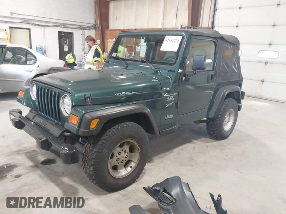 2000 Jeep Wrangler Sport with VIN 1J4FA49S2YP712526, listed as a IAAI auction lot 42151725 with 99,416 mi miles. Bid and sale history available at carsss.com. Image 2.
