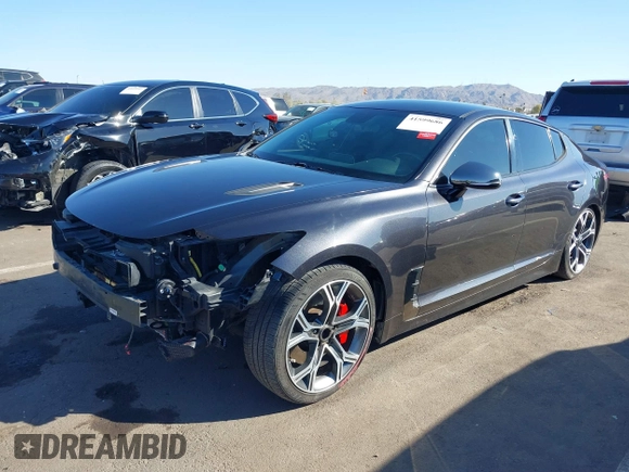 2019 Kia Stinger GT with VIN KNAE35LC3K6059198, listed as a IAAI auction lot 41599686 with 82,886 mi miles. Bid and sale history available at carsss.com. Image 18.