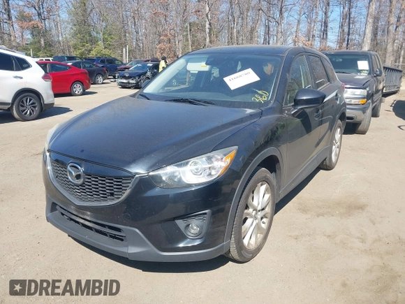 2014 Mazda CX-5 Grand Touring with VIN JM3KE4DY1E0339690, listed as a IAAI auction lot 41668780 with 216,825 mi miles. Bid and sale history available at carsss.com. Image 17.