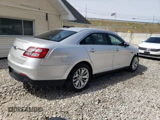 2014 Ford Taurus Limited with VIN 1FAHP2F83EG106227, listed as a Copart auction lot 63055365 with 194,026 mi miles and Salvage title. Bid and sale history available at DreamBid. Image 3.
