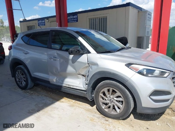 2018 Hyundai Tucson SE with VIN KM8J23A48JU646278, listed as a IAAI auction lot 41941577 with 115,228 mi miles. Bid and sale history available at carsss.com. Image 6.