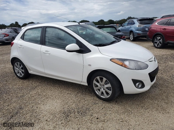 2012 Mazda Mazda2 Touring with VIN JM1DE1LY8C0137590, listed as a Copart auction lot 74488974 with 0 mi miles and Salvage Title. Bid and sale history available at carsss.com. Image 4.
