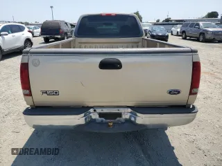 2000 Ford F-150 XL with VIN 1FTZF172XYNB65958, listed as a Copart auction lot 59946145 with 208,988 mi miles and Salvage title. Bid and sale history available at DreamBid. Image 6.