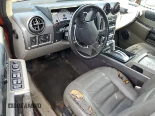 2003 Hummer H2 with VIN 5GRGN23U73H141713, listed as a Copart auction lot 84285624 with 152,719 mi miles and Non Repairable. Bid and sale history available at carsss.com. Image 8.