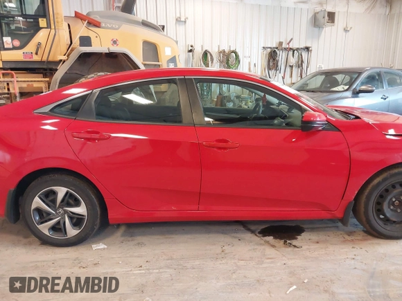 2020 Honda Civic LX with VIN 2HGFC2F63LH507310, listed as a IAAI auction lot 42180914 with 54,599 mi miles and . Bid and sale history available at DreamBid. Image 14.