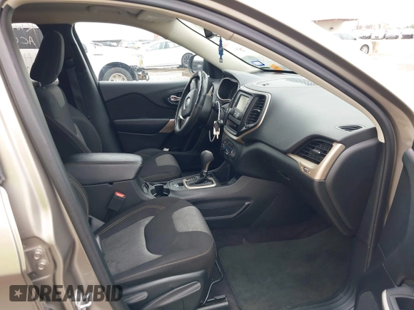 2017 Jeep Cherokee Altitude with VIN 1C4PJLABXHW613975, listed as a IAAI auction lot 42122784 with 101,626 mi miles and . Bid and sale history available at DreamBid. Image 5.
