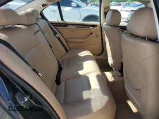 2004 BMW 3 Series 325xi with VIN WBAEU33404PR08565, listed as a Copart auction lot 57865215 with 253,784 mi miles and Salvage title. Bid and sale history available at DreamBid. Image 10.