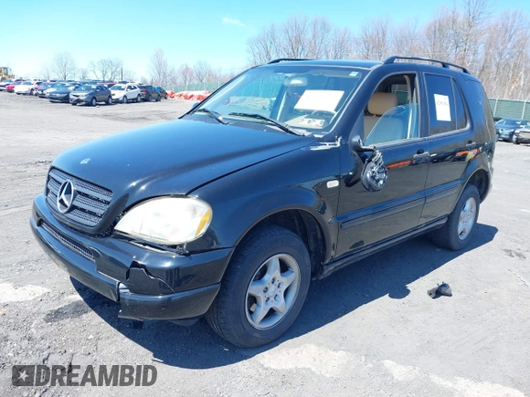 2000 Mercedes-Benz M 320/430/500 with VIN 4JGAB54E5YA165724, listed as a IAAI auction lot 42001654 with 138,997 mi miles and . Bid and sale history available at DreamBid. Image 2.