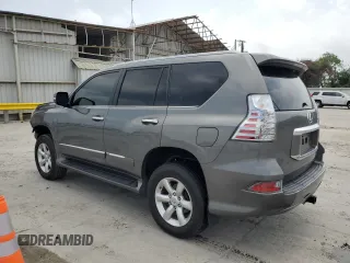 2014 Lexus GX 460 z VIN JTJBM7FX8E5089947, wystawiony jako Copart lot #56160995 z przebiegiem 136 025 mil mil oraz Szkoda całkowita • Salvage title. Historia ofert i sprzedaży dostępna na DreamBid. Obrazek 2.
