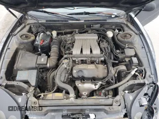 1998 Mitsubishi 3000GT z VIN JA3AM44H8WY000594, wystawiony jako Copart lot #44164155 z przebiegiem 92 227 mil mil oraz Czysty tytuł • Clean title. Historia ofert i sprzedaży dostępna na DreamBid. Obrazek 11.