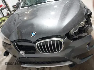 2018 BMW X1 xDrive28i with VIN WBXHT3C38J5L34625, listed as a IAAI auction lot 41133876 with 60,986 mi miles and . Bid and sale history available at DreamBid. Image 12.