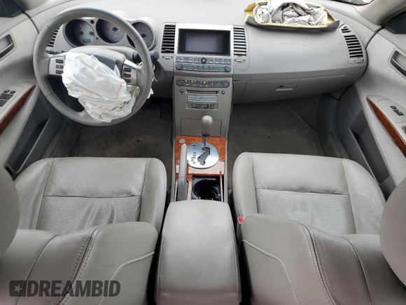 2004 Nissan Maxima SL with VIN 1N4BA41E74C824398, listed as a Copart auction lot 51312995 with 143,549 mi miles and Salvage Title. Bid and sale history available at DreamBid. Image 8.