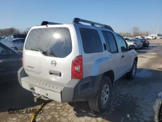 2014 Nissan Xterra X with VIN 5N1AN0NW1EN804235, listed as a Copart auction lot 83661084 with 103,482 mi miles and Salvage Title. Bid and sale history available at DreamBid. Image 3.