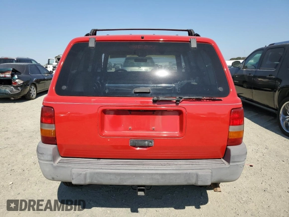 1997 Jeep Grand Cherokee TSi with VIN 1J4FX58SXVC545910, listed as a Copart auction lot 73142554 with 180,896 mi miles and Salvage Title. Bid and sale history available at carsss.com. Image 6.