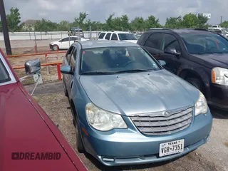 2009 Chrysler Sebring Touring *Ltd Avail* with VIN 1C3LC56D29N544726, listed as a IAAI auction lot 42036844 with 201,351 mi miles. Bid and sale history available at carsss.com. Image 1.