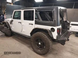 2017 Jeep Wrangler Unlimited Sport with VIN 1C4BJWDG9HL565213, listed as a IAAI auction lot 40999452 with 50,586 mi miles. Bid and sale history available at carsss.com. Image 3.