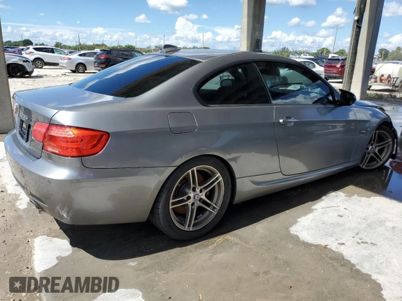 2011 BMW 3 Series 335is with VIN WBAKG1C52BE617713, listed as a Copart auction lot 74064204 with 132,742 mi miles and Salvage Title. Bid and sale history available at carsss.com. Image 3.