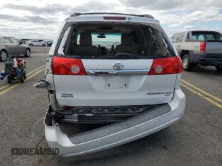2010 Toyota Sienna XLE с VIN 5TDDK4CC5AS029985, выставлен на аукционе Copart как лот 84182164 с пробегом 232 460 миль миль и Списание • Salvage title. История ставок и продаж доступна на DreamBid. Изображение 6.