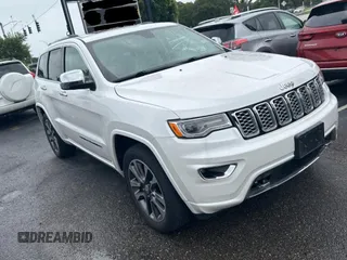 2017 Jeep Grand Cherokee Overland with VIN 1C4RJFCGXHC633065, listed as a Copart auction lot 63276785 with 134,680 mi miles and Clean title. Bid and sale history available at DreamBid. Image 1.