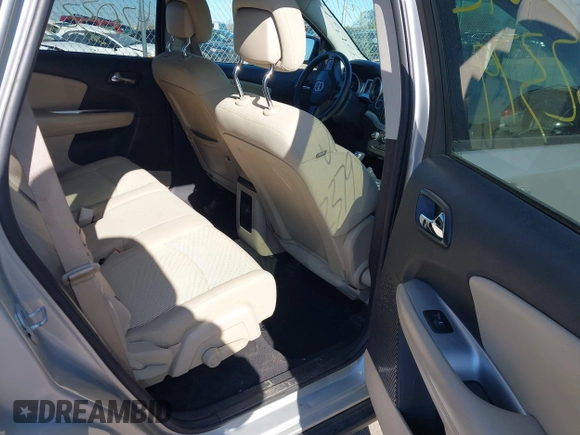 2013 Dodge Journey SXT with VIN 3C4PDDBG4DT506900, listed as a IAAI auction lot 42032379 with 130,911 mi miles and . Bid and sale history available at DreamBid. Image 8.