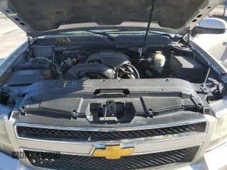 2007 Chevrolet Tahoe LT with VIN 1GNFC13J17J145992, listed as a Copart auction lot 57673385 with 151,804 mi miles and Salvage title. Bid and sale history available at DreamBid. Image 12.