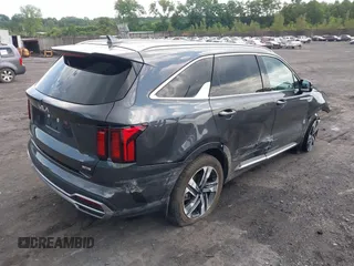 2023 Kia Sorento EX with VIN KNDRHDLG9P5159354, listed as a IAAI auction lot 42559220 with 34,733 mi miles and . Bid and sale history available at DreamBid. Image 4.