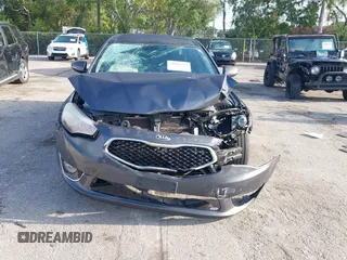 2016 Kia Cadenza Premium with VIN KNALN4D76G5207273, listed as a IAAI auction lot 42018231 with 92,460 mi miles. Bid and sale history available at carsss.com. Image 12.